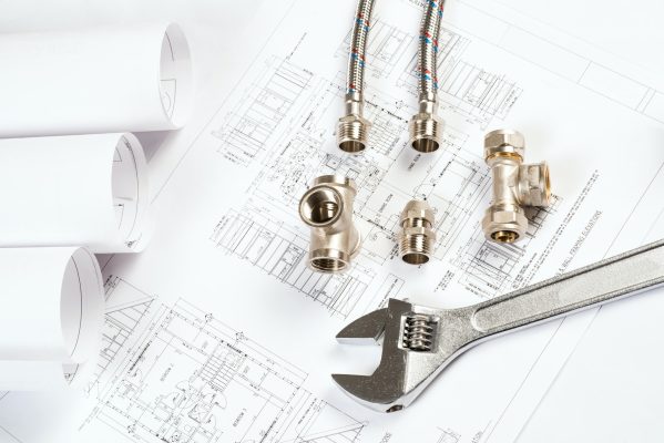 plumbing and drawings, construction still life plumbing and drawings, construction still life